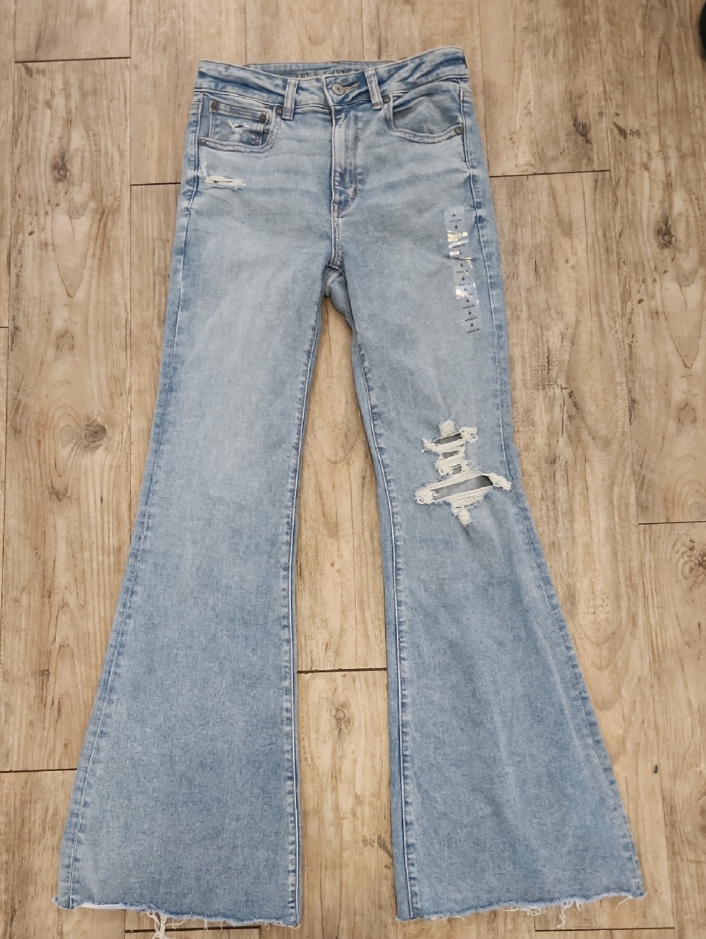 American Eagle Outfitters Light Blue Super Highrise Distressed Flare Jeans